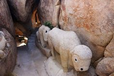 there are two statues of bears in the rocks