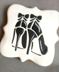 a cookie with black and white designs on it