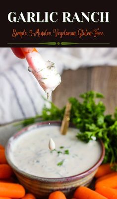 garlic ranch dip with carrots and parsley in a bowl on the side, ready to be eaten