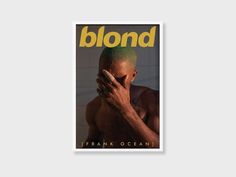 a man with green hair covers his face on the cover of a magazine that reads blond