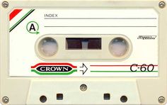 an old white tape recorder with the word crown on it's front and side