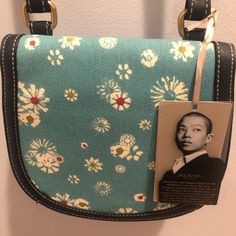 Brand New With Tags And Never Used. Blue Floral Pattern And Adjusts Cross Body Strap. Blue Floral Print Shoulder Bag For Everyday, Trendy Blue Floral Print Bags, Casual Blue Floral Print Shoulder Bag, Blue Embroidered Crossbody Bag, Blue Floral Print Travel Bag, Blue Floral Pattern, Jason Wu, Blue Floral, Cross Body