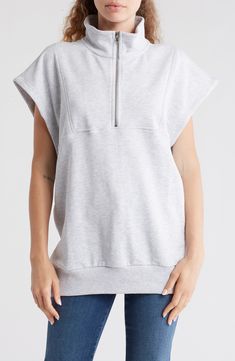 Layer on this sleeveless quarter-zip sweatshirt constructed from soft cotton-blend French terry with a cozy stand collar and vented hem. Quarter-zip closure Stand collar Sleeveless 50% cotton, 50% polyester Machine wash, line dry Made in Turkey Spring Sweatshirt With Zipper Closure For Loungewear, Sporty Funnel Neck Top With Zipper Closure, Athleisure Cotton Funnel Neck Top, Cotton Loungewear Top With Zipper Closure, Cotton Tops With Zipper Closure For Loungewear, Cotton Athleisure Top With Funnel Neck, Spring Crew Neck Tops With Zipper Closure, Crew Neck Tops With Zipper For Spring, Casual Tops With Zipper Closure For Loungewear