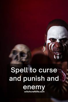 a man with his face painted white and holding a knife in front of two skulls