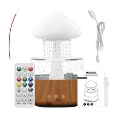 an image of a lamp that is on top of a wooden stand with remotes