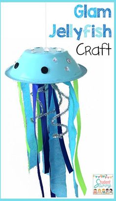 a blue jellyfish craft hanging from a string with the words glam jellyfish craft on it