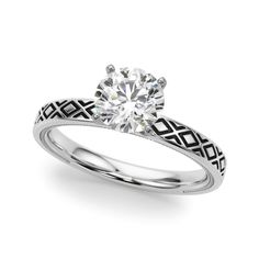 a white gold engagement ring with an intricate design on the shan shan shan shan shan shan shan