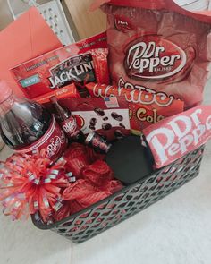 a basket filled with candy and snacks