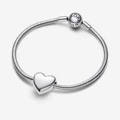 Make your mark on our engravable heart charm. Crafted in smooth sterling silver, our large polished heart is the perfect canvas for your message of love. It's the perfect personalized gift for everyone on your list - including yourself. - Pandora Be Love Engravable Large Heart Charm - Sterling silver Classic Heart Charm Bracelet In White Gold, White Gold Classic Heart Charm Bracelet, Classic Heart Pendant Bracelet As Gift, Classic Silver Heart Bracelet, Classic Everyday Sterling Silver Charms, Classic White Gold Heart Bracelet, Classic Heart Charm Bracelet As Gift, Classic Heart Charm Bracelet Gift, Classic Gold Heart Charm Bracelet