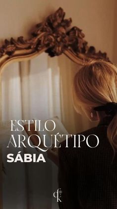 a woman standing in front of a mirror with the words estilo arquifipo sabia