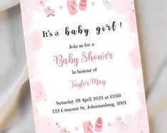 a pink baby shower is shown with its name on the front and bottom half of it