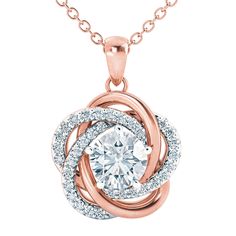 Exquisite symbols of love… This stunning rose-gold plated pendant features a Diamonisse simulated diamond solitaire at its center, accented by more sparkling simulated diamonds.Included in this very special offer, are perfectly matching earrings!This glittering and exceptional set features the incomparable radiance of over 85 stones and is sure to bring compliments galore, wherever it's worn.A sumptuous presentation pouch — perfect for gift-giving and safekeeping — and a match Rose Gold Necklaces With Halo Design For Anniversary, Anniversary Rose Gold Necklaces With Halo Design, Anniversary Rose Gold Necklace With Halo Design, Rose Gold Jewelry With Halo Design Round Pendant, Symbols Of Love, Accessories Jewelry Necklace, Love Knot, Love Symbols, Diamond Solitaire