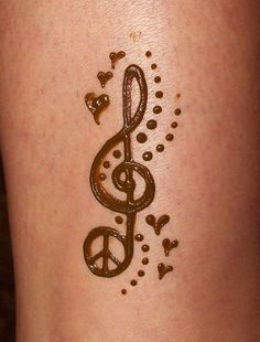 an image of a tattoo with music notes on it