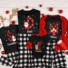 🎄 CUSTOM FAMILY NAME CHRISTMAS SHIRT 2024: Create lasting memories with our monogrammed family tees! ✅ High-quality print on comfortable fabric ✅ Customizable with family monogram and individual names ✅ Perfect for holiday photos and gatherings ✅ Ideal gifted Christmas present for the whole family ���🎨 DESIGN FEATURES: Custom family monogram in festive red letters Charming Christmas characters (Santa, reindeer, elf, fairy) Snowflake background for a magical touch Space for individual family membe Elf Fairy, Matching Family Christmas Pajamas, Snowflake Background, Red Letters, Family Design, Family Monogram, Christmas Monogram, Name Christmas, Santa Reindeer