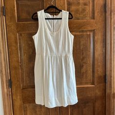 J. Crew Ivory Colored Sleeveless Dress - Women's Size Medium - Brand New W/Tags Pit To Pit Measurement Is 20" With A Dress Length Of 38" Fabric Is 100% Cotton With Trim Of 70% Linen/30% Cotton Dress Is Brand New W/Tags Cream Sleeveless Daywear Dress, Sleeveless Cream Linen Dress, Cream Sleeveless Linen Dress, Cream Linen Sleeveless Dress, White Lined Sleeveless Cotton Dress, Cream Sleeveless Sundress For Daywear, Sleeveless Lined Linen Dress, Lined Sleeveless Linen Dress, White Sleeveless Linen Dress