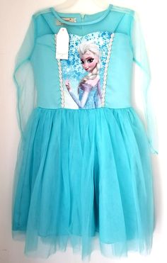 a frozen princess dress hanging on a wall with a tag attached to the back of it