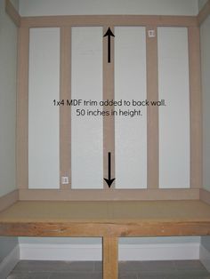 an empty bench with measurements for the back wall