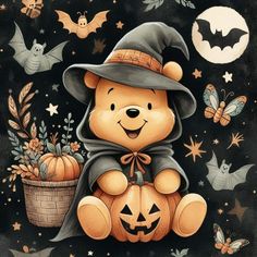 a teddy bear wearing a witches hat and sitting on a pumpkin with bats around it