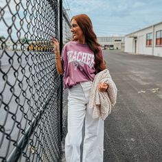 Part of our Teacher's Collection- look at those CUTE little apples in the word 'teacher'! Printed with ink on a Berry 100% cotton Comfort Colors (customer fave!) unisex fitted tee. Adrianna is 5'5 wearing a large. Size up for an oversized fit! Trendy Fall T-shirt For School, Casual Fall T-shirt For School, Relaxed Fit T-shirt For School In Fall, Trendy School T-shirt For Fall, Relaxed Fit School Spirit T-shirt For Fall, College Style Cotton T-shirt For Fall, School Spirit Cotton T-shirt For Everyday, Cotton School Spirit T-shirt, Cotton T-shirt With School Spirit For Everyday