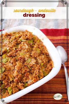 a casserole dish with stuffing in it on a red and orange place mat