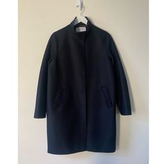 New, Never Worn Harris Wharf London Women's Coat. Dark Navy, Cocoon,Eggshaped Silhouette, Medium Weight Pressed Wool Coat, Firm Wool Keeps It's Shape, Fleece Lining At The Front Only, Otherwise Not Lined, Snap Closures, Side Pockets Length 36 3/4" Size M, Italian Size 44, Eu Size 40 Blue Outerwear With Concealed Placket, Navy Stand Collar Outerwear For Fall, Navy Outerwear With Pockets For Work, Navy Peacoat For Workwear In Fall, Chic Tailored Navy Outerwear, Chic Navy Tailored Outerwear, Modern Blue Outerwear For Office, Chic Peacoat With Pockets For Work, Navy Peacoat With Pockets For Work