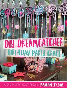 diy dream catcher birthday party craft is displayed on a table with pink and blue decorations