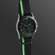 The Stovel Bay collection is comfortable and functional to wear on the go. Featuring tritium illumination, durable nato strap and contrasting colours it’s an everyday style statement. Tritium illumination is self powered, safe and reliable form of illumination which provides a constant glow throughout the night without fading. Stainless Steel case10 ATM water resistanceBlack dial with Silver IndexBlack and Green Nylon StrapTritium Green Illumination indexDate FeatureCase Size 42mm Quartz Movemen Green Analog Watch For Everyday Use, Casual Black Watch For Everyday Use, Casual Black Watches, Functional Black Watches For Everyday Use, Contrasting Colours, Nato Strap, Forever Jewelry, Luxury Timepieces, Watch Companies