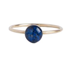 Dainty adorable ring with tiny Lapis Lazuli stone pieces captured in glass like resin in a 5mm round shape. Bright natural blue ring is a perfect compliment to your everyday style. Every piece is hand made in our studio and always unique. 14k gold-filled ring is water and sweat resistant, second to solid gold, providing a long life for your piece. Sensitive skin friendly.Though even the best need care over time - you can maintain your jewelry��’s shine by avoiding contact with chemicals, perfume, Lapis Ring, Blue Ring, Lapis Lazuli Stone, Gold Filled Ring, Blue Rings, Independent Designers Fashion, Long Life, Everyday Style, Badger