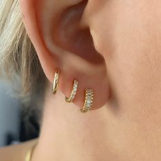 2X11mm 14K Yellow Gold Huggie Hoop Earring. These tiny hoops will perfectly “hug” your ears and are so comfortable because of the "eternity" style hoop. No poking at the back of your ear while sleeping. Please allow 1 week for Fine Jewelry to ship out. Our gold is ethically and sustainably sourced. All jewelry comes in a box ready to gift. Halo Huggie Earrings As Gift, 14k Gold Huggie Earrings With Halo, 14k Gold Huggie Earrings With Halo Detail, Gold Hoop Earrings Aesthetic, 3rd Piercing, Hoop Earrings Aesthetic, Earrings Aesthetic, Earrings Hypoallergenic, Huggie Earrings