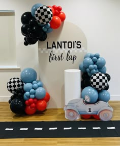 balloons are arranged in the shape of race cars on display at lanto's first leap