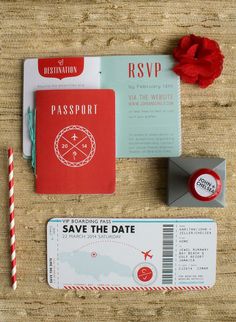 an airplane ticket, passport and candy cane on a table