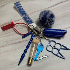 several different items are laying out on the table together, including scissors and shears