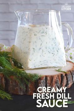 creamy fresh dill sauce in a glass pitcher