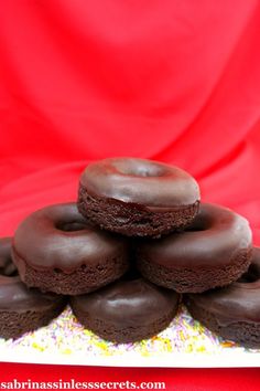 chocolate donuts stacked on top of each other