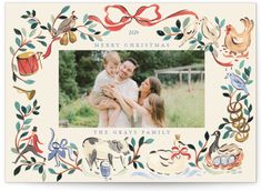 a christmas card with an image of a family