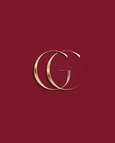 the letter g in gold on a red background