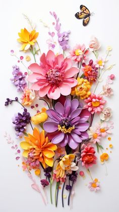 an arrangement of colorful flowers on a white background with a butterfly flying above it,