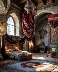 an ornate bedroom with red drapes and curtains