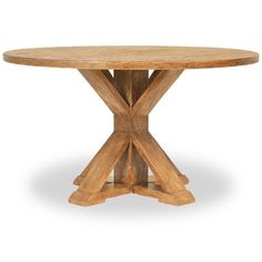 a round wooden table sitting on top of a white floor