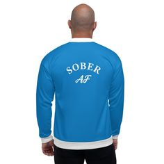 Declare your unwavering commitment to sobriety and exude confidence with our stylish "Sober AF" Varsity-Style Bomber Jacket. This classic varsity-inspired jacket features a bold black and white design with the empowering message "Sober AF" proudly displayed on the front and back. Made from premium materials with a comfortable fit, this bomber jacket is the perfect way to express your pride and inspire others. Whether you're cheering on a loved one's recovery journey or celebrating your own personal achievements, this jacket is sure to become a staple in your wardrobe. • 100% polyester • Fabric weight: 6.49 oz/yd² (220 g/m²), weight may vary by 5% • Brushed fleece fabric inside • Unisex fit • Overlock seams • Sturdy neck tape • Silver YKK zipper • 2 self-fabric pockets • Blank product compo Personal Achievements, Varsity Style, Exude Confidence, Classic Jacket, Embroidered Hats, Embroidered Hoodie, Ykk Zipper, Zip Up Hoodies, Black And White Design