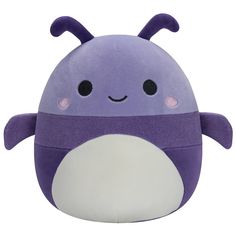 a purple and white stuffed animal with black eyes