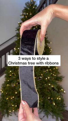 someone is holding a christmas tree with ribbons in front of a christmas tree and the words 3 ways to style a christmas tree with ribbons