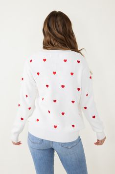 Stay cozy and stylish in this Miracle Heart Sweater for Women in White. The long sleeves and red heart pattern provide a stylish look, perfect for any occasion. Feel confident and cozy with the perfect sweater! Features: Miracle Style: W8009-IVORYRED Color: Ivory Red 53% Viscose 26% Nylon 21% Polyester Women’s sweaters Super soft material Midweight construction Long sleeves Red heart pattern Measurements from a size small: Length from center back: 21” Chest: 50”