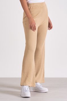 Lounge in luxury with Odie pants. These wide-leg waffle knit trousers merge sweatpant comfort with elevated style for a cozy yet chic look. Stretch Ribbed Wide Leg Pants, High-waisted Ribbed Wide Leg Pants For Fall, Solid Wide Leg Ribbed Pants, Ribbed Wide Leg Pants For Fall, Solid Ribbed Wide Leg Pants, Solid Color Ribbed Wide-leg Pants, Chic Wide Leg Ribbed Pants, Trendy Wide Leg Ribbed Bottoms, Comfy Ribbed Bottoms