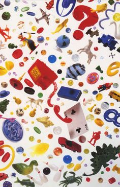 an image of many different objects in the air on a white surface with circles and dots