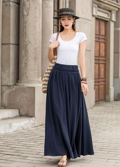 "Get dressed and out of the door in classic good looks with this pleated Long maxi skirt, crafted with soft cotton linen fabric, featuring pleated waist detail and two big pockets. DETAIL * 50% linen, 50% cotton * Has no lining, Not see through * Pleated around waist * Two side seam pockets * Belt loops on waistband * Right Side zipper closure * Perfect for spring and summer, spring, autumn * Need Help how to select the size, Just Leave Your usual wear size Height Weight Waist Hips SIZE GUIDE Si Summer Cotton Pleated Skirt, Relaxed Fit, Cotton Summer Pleated Skirt, Spring Pleated Cotton Maxi Skirt, Spring Cotton Maxi Skirt For Work, Summer Cotton Pleated Midi Skirt, Elegant Cotton Maxi Skirt For Spring, Solid Cotton Flowy Pleated Skirt, Solid Color Cotton Pleated Skirt, Flowy, Long Cotton Skirt With Pleated Hem