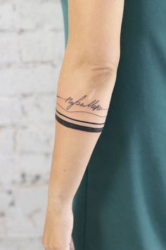 a woman's arm with a tattoo on it that reads, my love is in the air