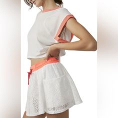 White Sporty White Skort For Day Out, Casual White Skort, White Sporty Skort For The Beach, White Sporty Skort For Beach, Sporty White Skort For Beach, White Skort With Built-in Shorts For Beach, Short Athleisure Tops For Beach, Short Athleisure Tops For The Beach, White Short Top For Vacation