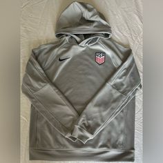 Brand New Nike Uswnt Us National Team Dri-Fit Pullover Hoodie Do6131-050. Women’s Sz: Medium. 100% Authentic With Original Tags. Any Questions Please Feel Free To Ask. Please Check My Feedback And Shop With Confidance. Nike Long Sleeve Hoodie For Winter, Nike Winter Hoodie, Nike Long Sleeve Hoodie With Double-lined Hood, Nike Winter Sweater, Nike Sporty Winter Sweater, Nike Gray Winter Hoodie, Nike Winter Sweater With Ribbed Cuffs, Cozy Nike Hoodie For Winter, Athleisure Long Sleeve Hoodie For Cold Weather