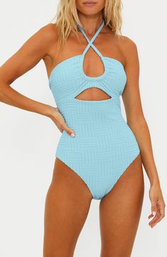 Feel your best on land and at sea in this textured one-piece fashioned with sunny cutouts and a halter neck. Ties at neck Halter neck Moderate back coverage 96% polyester, 4% spandex Machine wash, tumble dry Imported One-piece Textured Swimwear For Poolside, Textured One-piece Swimwear For Poolside, Textured Swimwear For Spring And Summer, Textured Swimwear For Summer, Textured Swimwear For Spring Beach Outings, Textured Swimwear For Beach In Spring, Textured One-piece Swimwear For Swimming, Textured Sleeveless Swimwear For Vacation, Textured Summer Swimwear For Vacation